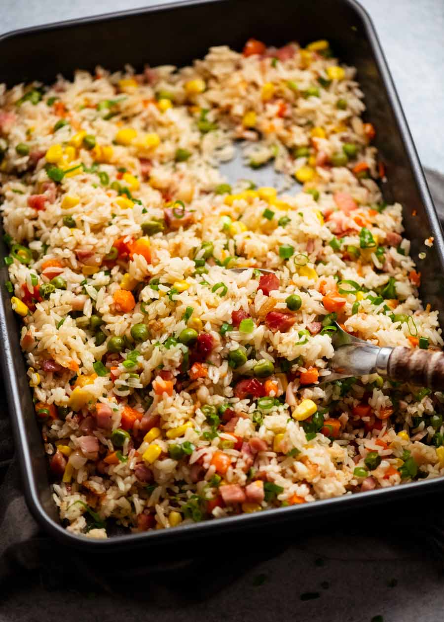 "Dump 'n Bake" Fried Rice in a baking pan, fresh out of the oven