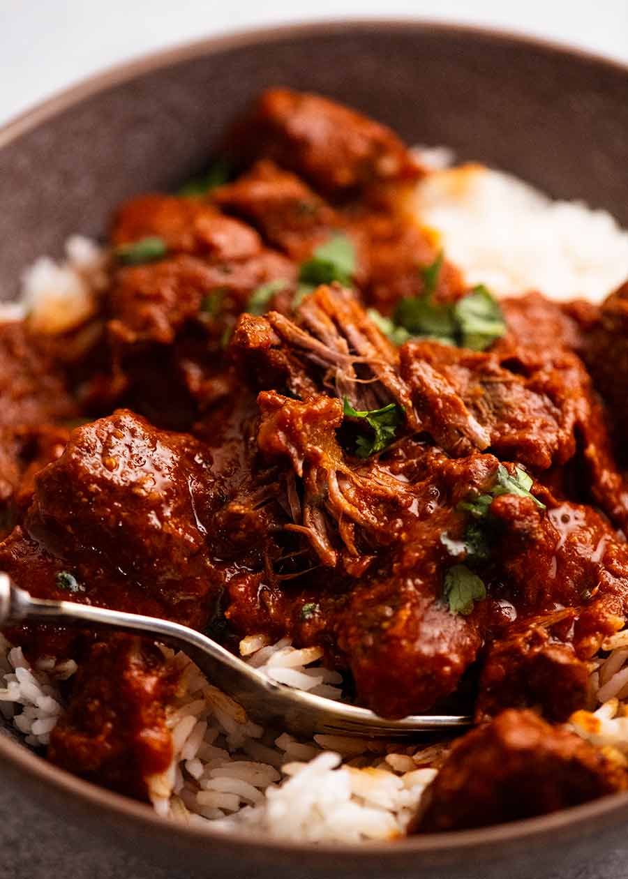 Close up of Vindaloo served over rice