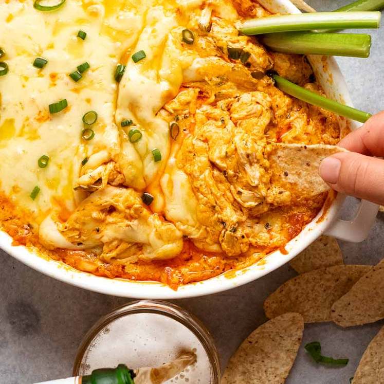 Overhead photo of people eating Hot Buffalo Chicken Dip