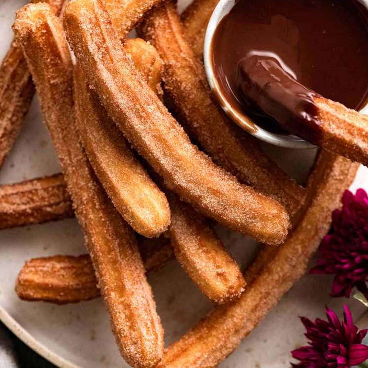 Plate of Churros recipe with chocolate dipping sauce