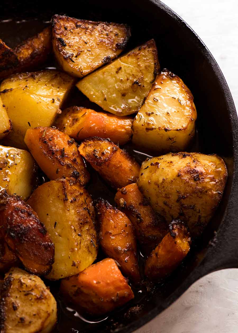 Roasted Vegetables with Marinated Roast Beef in a black skillet