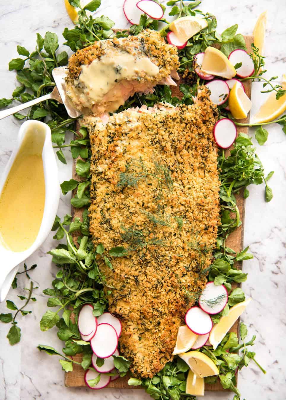 Baked Parmesan Crusted Salmon with Lemon Cream Sauce - easy and fast to make, can be prepared ahead, a stunning centrepiece for Christmas dinner and yet easy enough for midweek. That Lemon Cream sauce is the perfectly finishing tough. www.recipetineats.com