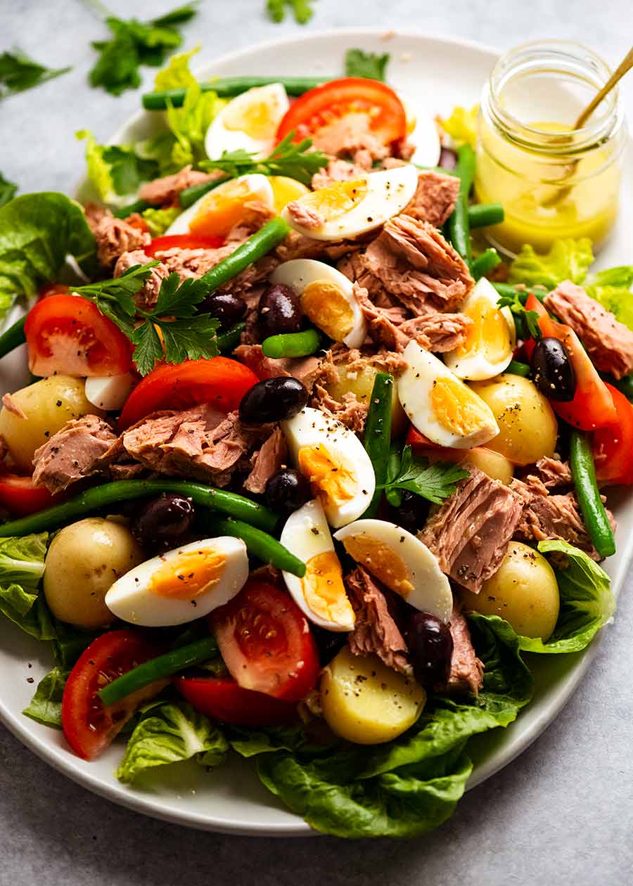 Platter piled high with Salad Nicoise - French Tuna Salad, ready to be served