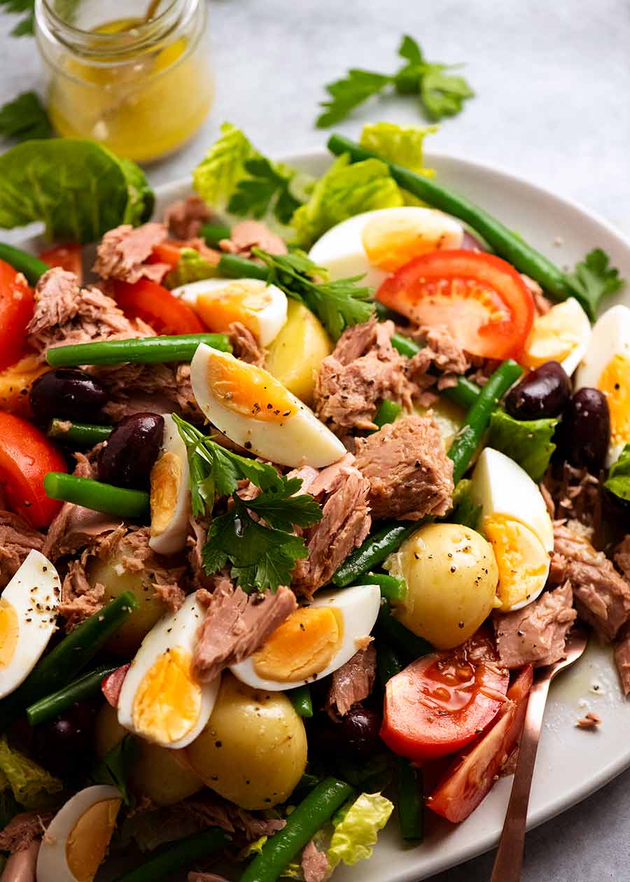 Big plate of Salad Nicoise - French Tuna Salad, ready to be eaten