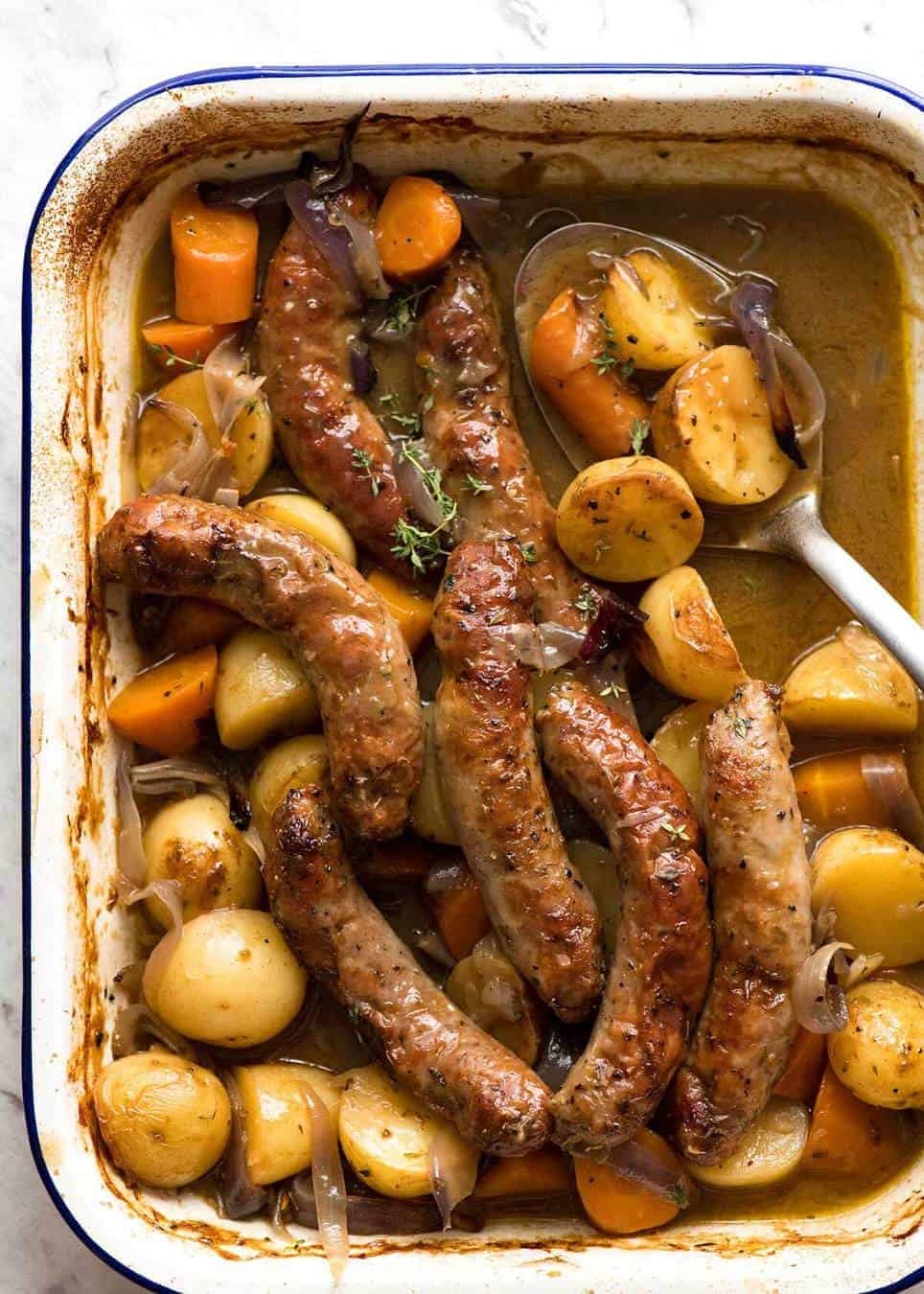 A Sausage Bake and Vegetables WITH Gravy, all made in one pan! Yes, that's right - even the GRAVY is made in the same pan while it's baking! recipetineats.com