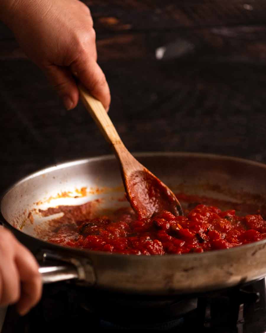Making Spaghetti alla Puttanesca sauce