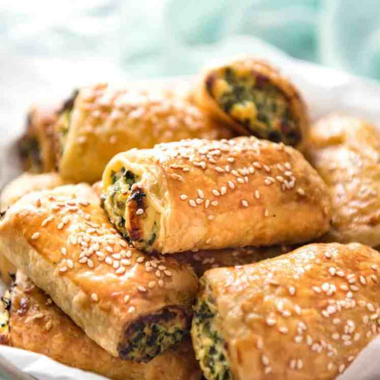 Spinach and Ricotta Rolls - a moist cheesy filling enclosed with buttery flaky puff pastry. Great make ahead for freezing! www.recipetineats.com